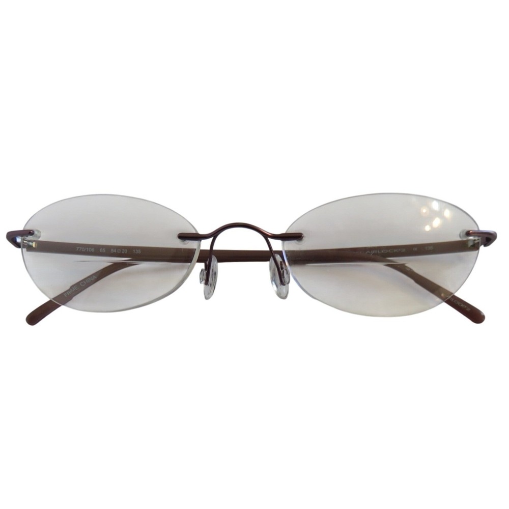 Marchon Airlock 2 Purple Rimless Oval Eyeglasses 770/106 54-20-135 Womens